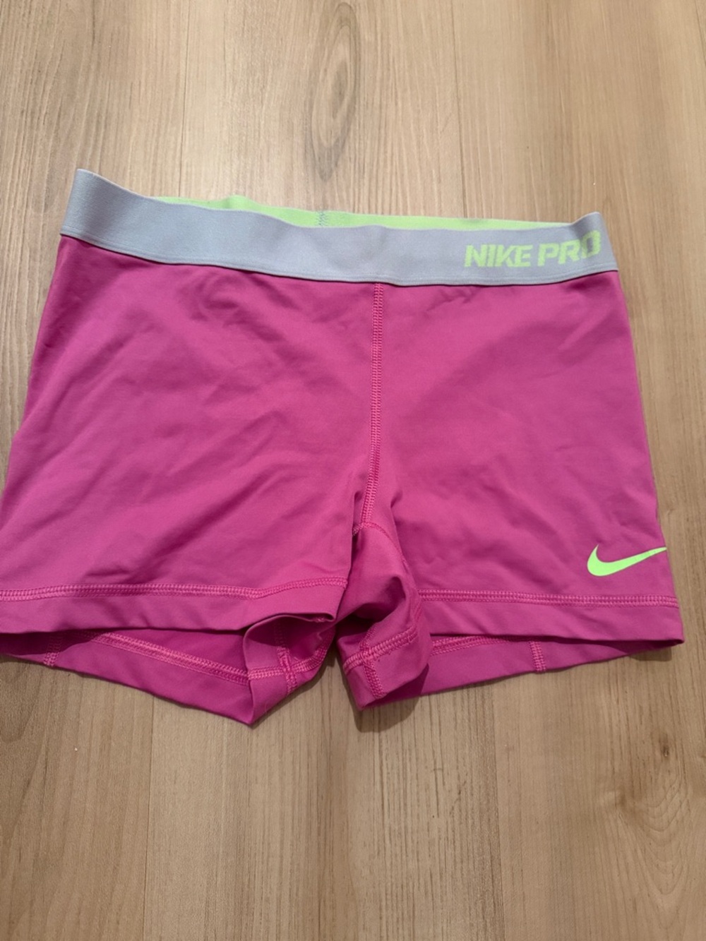 Nike Pro Pink Athletic Compression Shorts with Neon Lime Logo